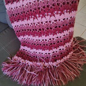Crocheted Throw Blanket pattern in multi-tonal shades of magenta and light pink